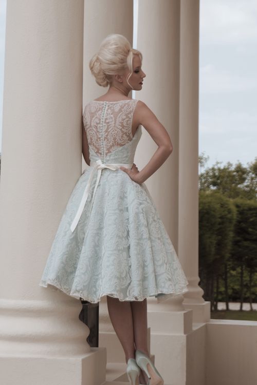 Contemporary sleeveless blue vintage tea length wedding dress .